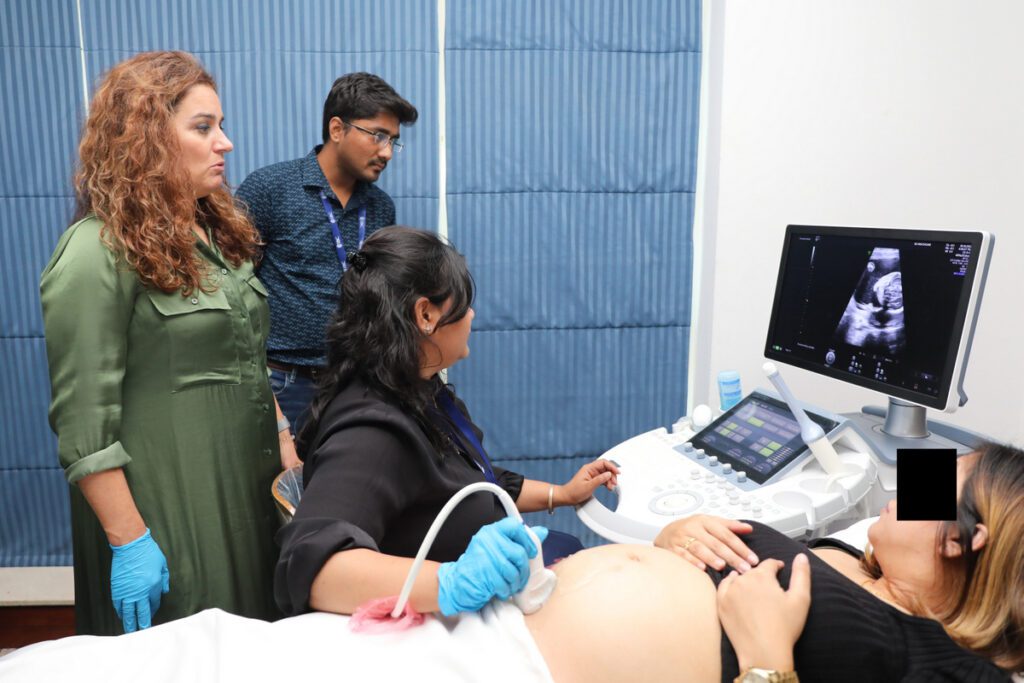 Dr Aashi Priyamvada Doing ultrasound of pregnant women - Lucknow Fetal Medicine Centre - LFMC